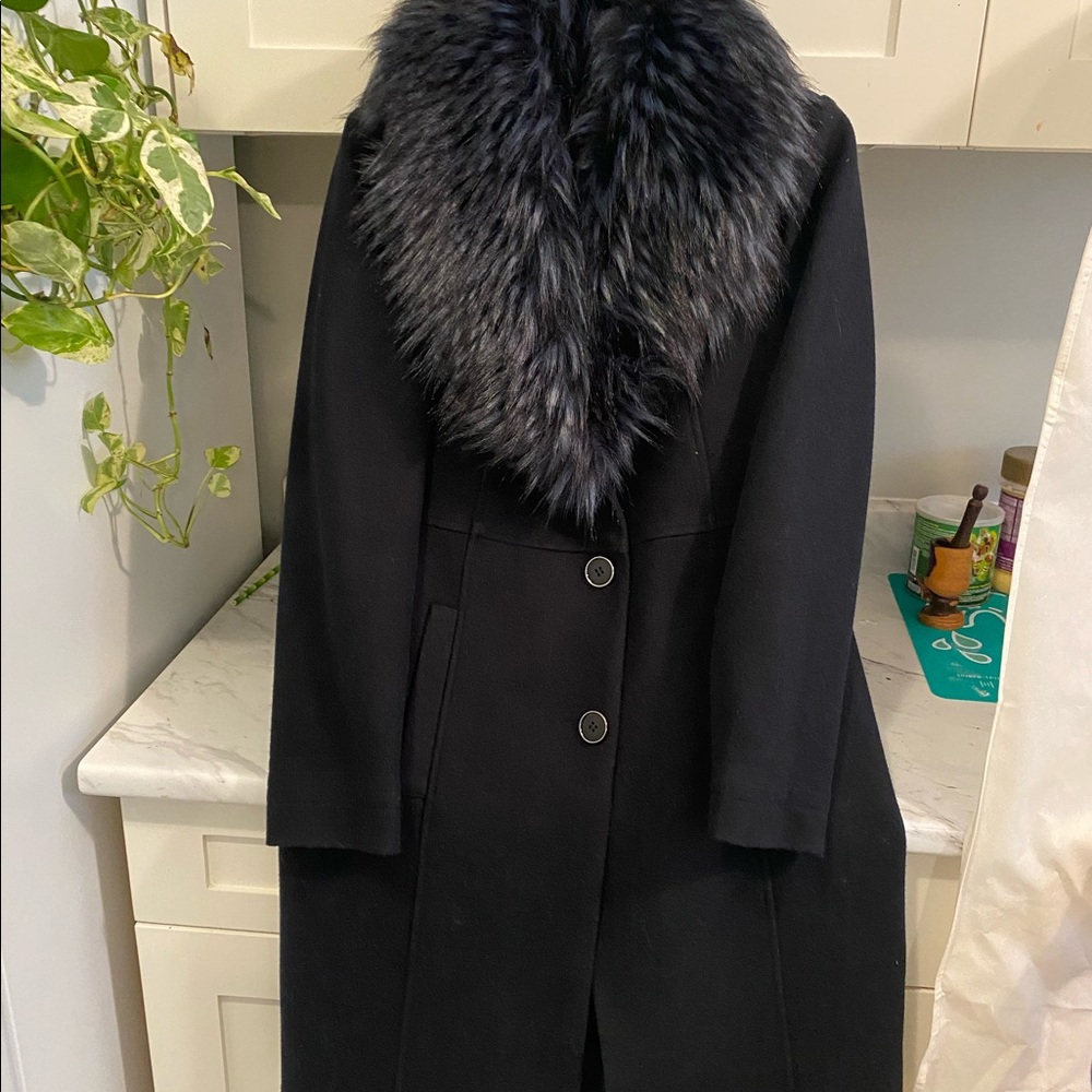 A dark blue Laura brand over coat 🧥.newt
